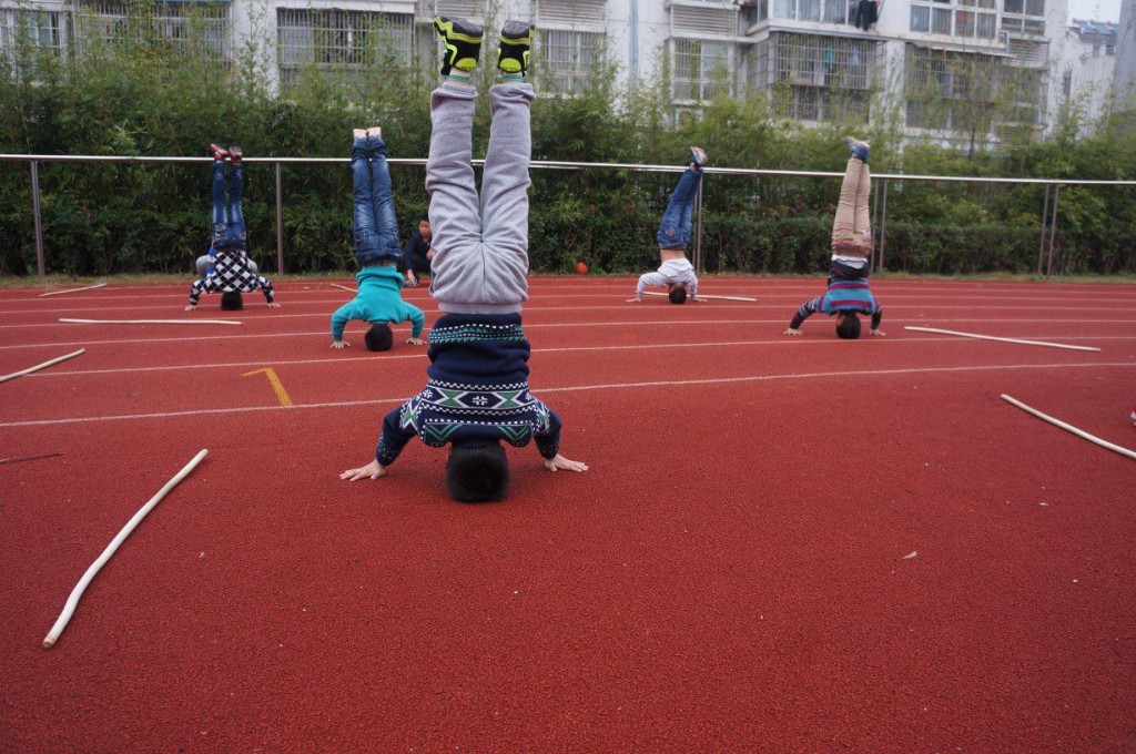 The students practicing martial arts.